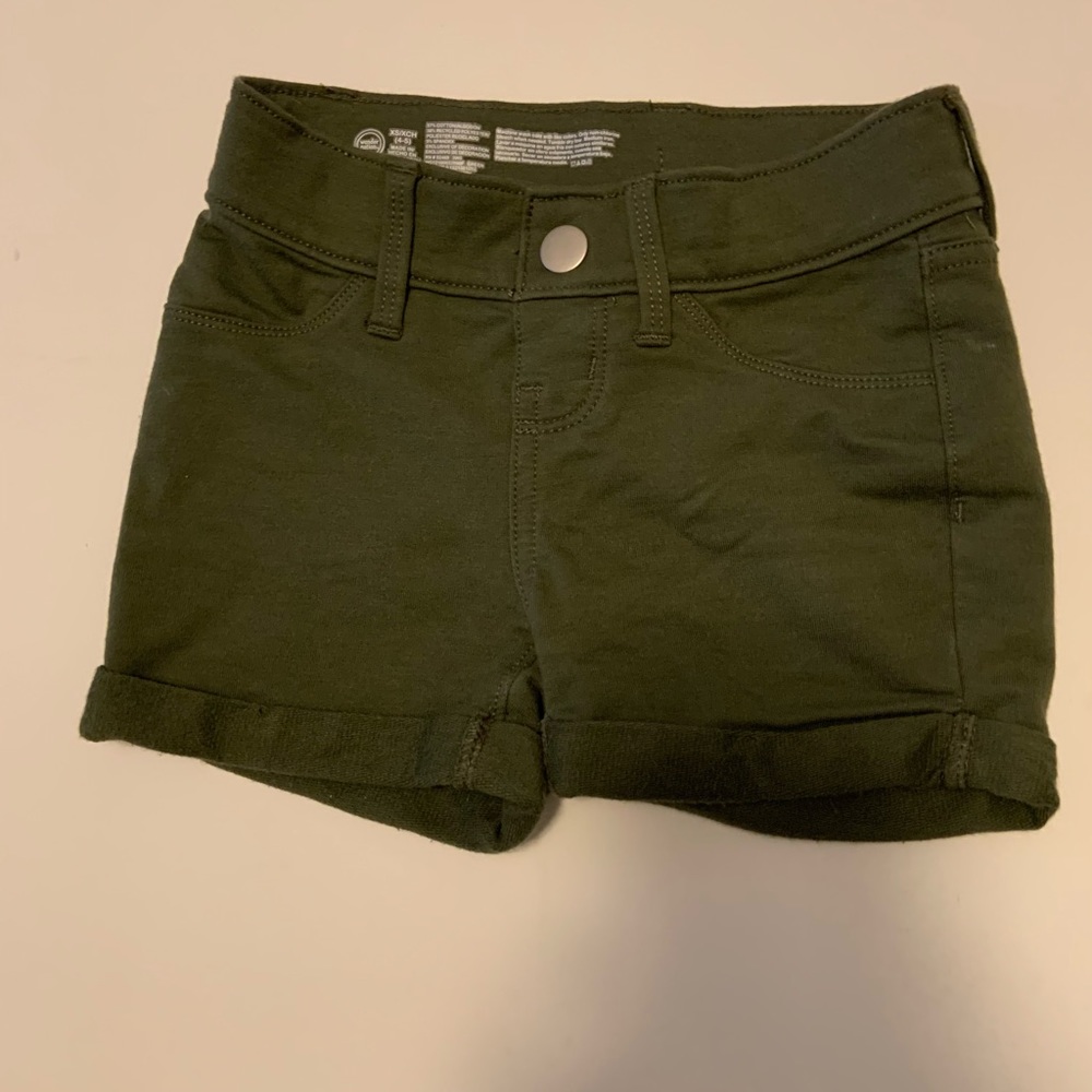 Olive green cotton shorts.